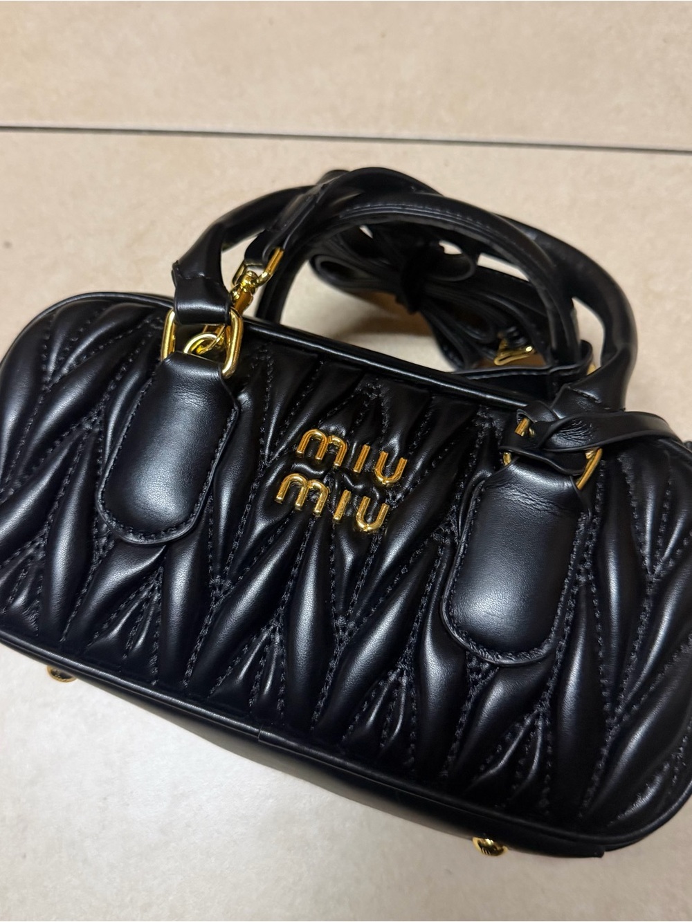 Miu Miu Black Quilted Leather Satchel with Gold Hardware